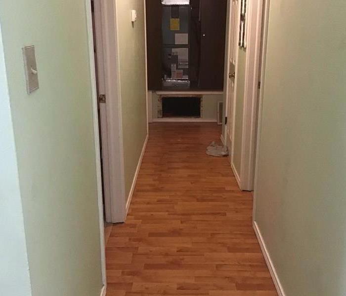 wet wood floor in hallway