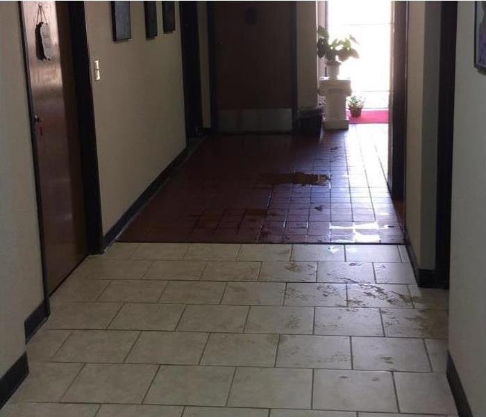 water on tile floor