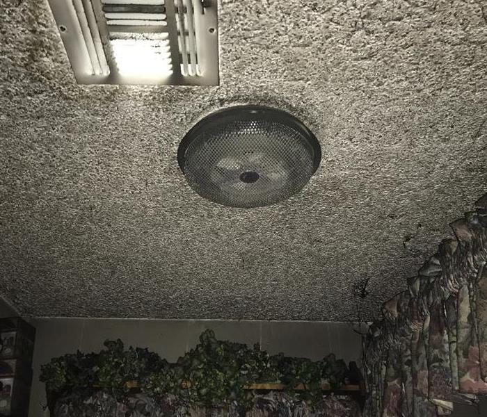 smoke damage ceiling, light fixture