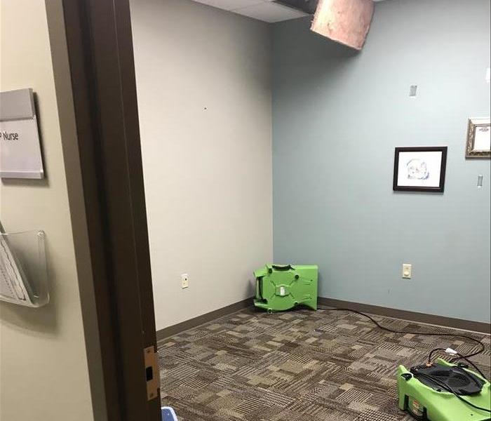 office, wet carpet, loose ceiling tiles, green equipment