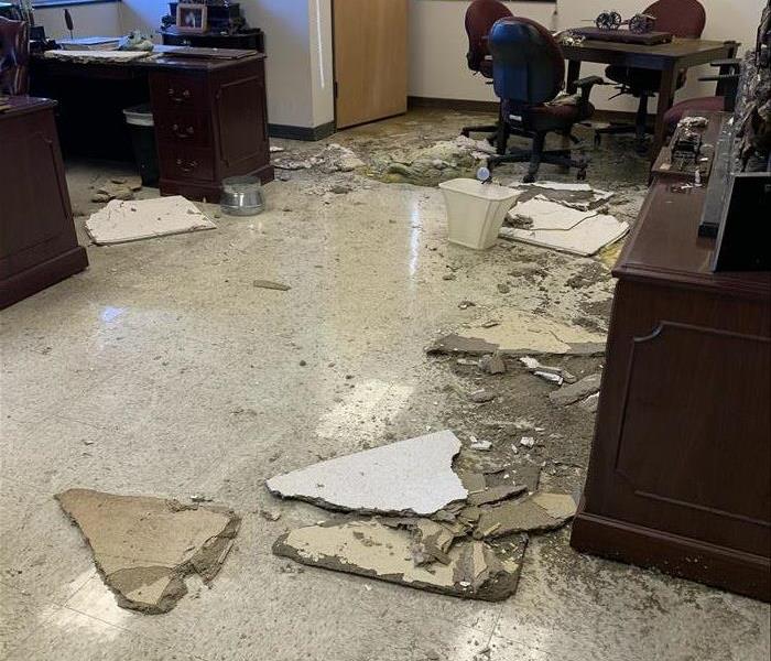 fallen ceiling tiles wet office
