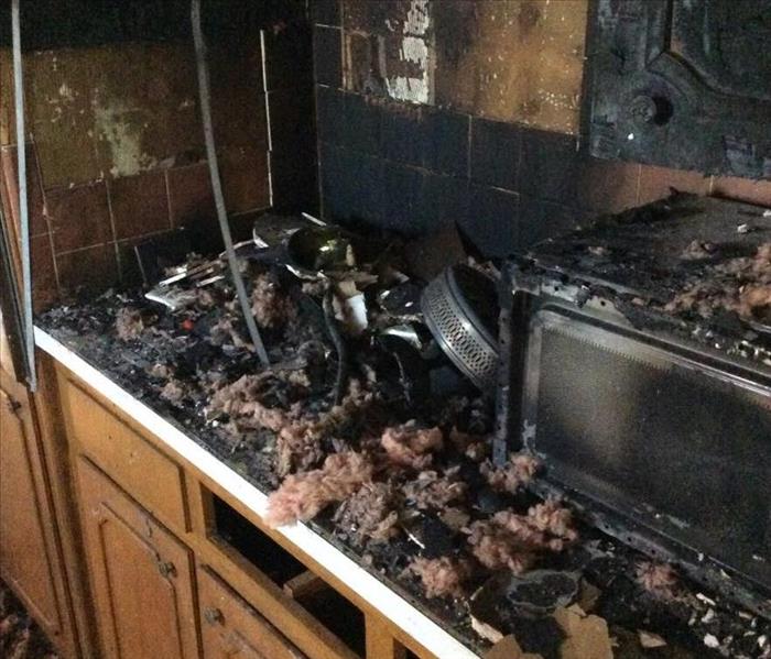 burned kitchen cabinets and countertops
