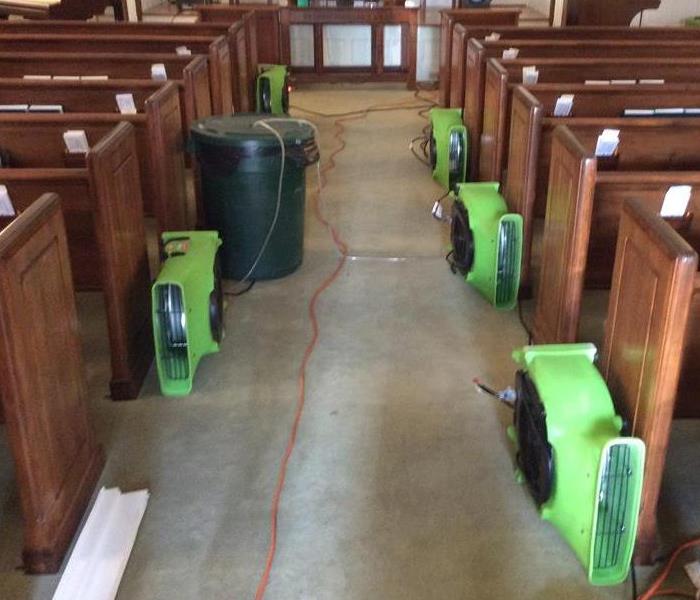church pews, wet floors