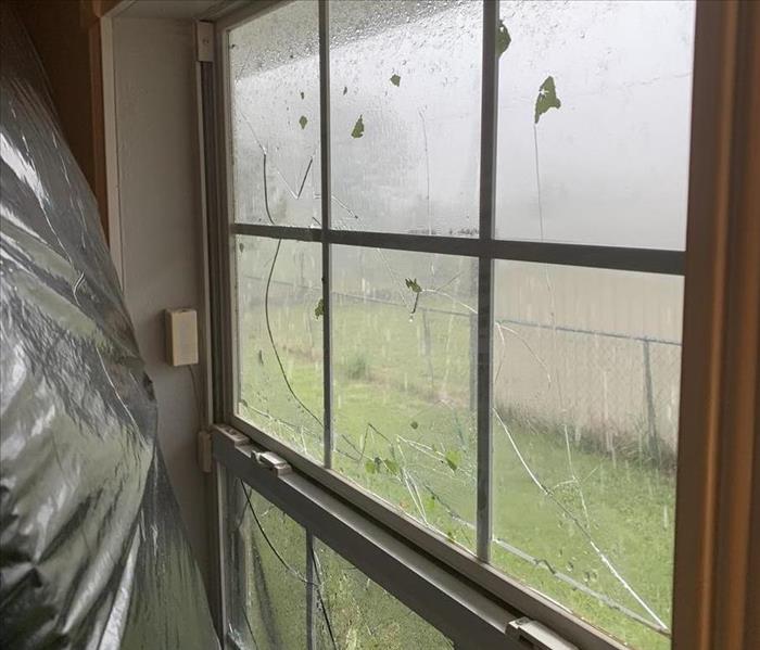broken window, raining outside