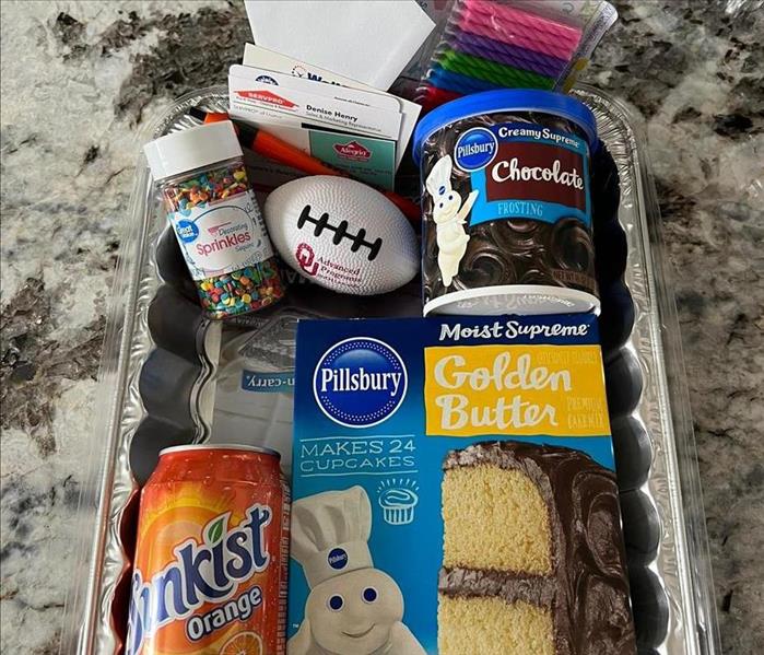 box of cake mix, frosting, candles for birthday