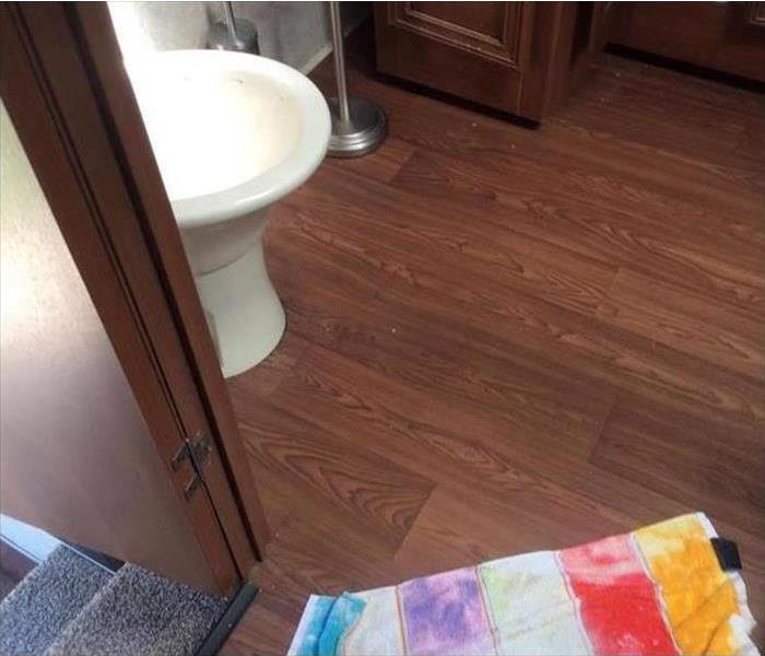 bathroom floor, towels